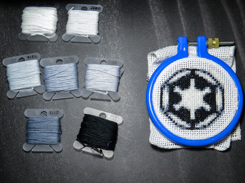 Star Wars Galactic Empire emblem in cross stitch with floss used